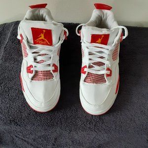 NIKE FLIGHT MENS SIZE 11.5 RED AND WHITE SNEAKERS. SLIGHTLY USED AND COMFORTABLE